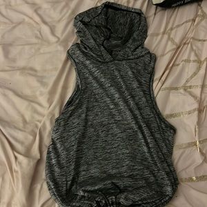 grey and black tank top with hood and back cut out